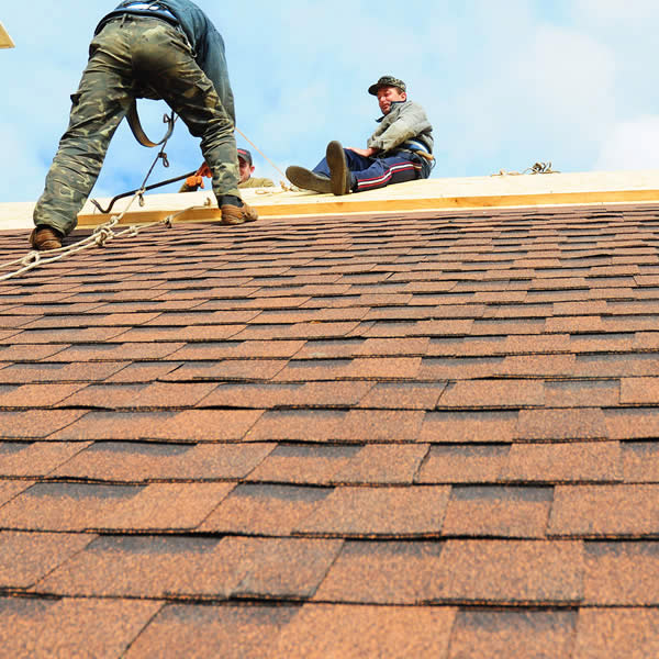 men repairing the roof